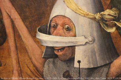 photographie “Le Jour ni l’Heure 5858 : Pieter Bruegel l’Ancien, 1525/1530-1569, dans le style de Hyeronimus Bosch, c. 1450-1516, La Chute des anges rebelles, 1562, dét., Bruxelles, musées royaux des Beaux-Arts de Belgique, dimanche 7 mai 2023, 13:24:18” par Renaud Camus — www.renaud-camus.net — Bruegel, Pieter Bruegel, Pieter Bruegel l'Ancien, Bosch, Jérôme Bosch, La Chute des anges rebelles, soldat, homme au casque, Bruxelles, musées royaux des Beaux-Arts de Belgique